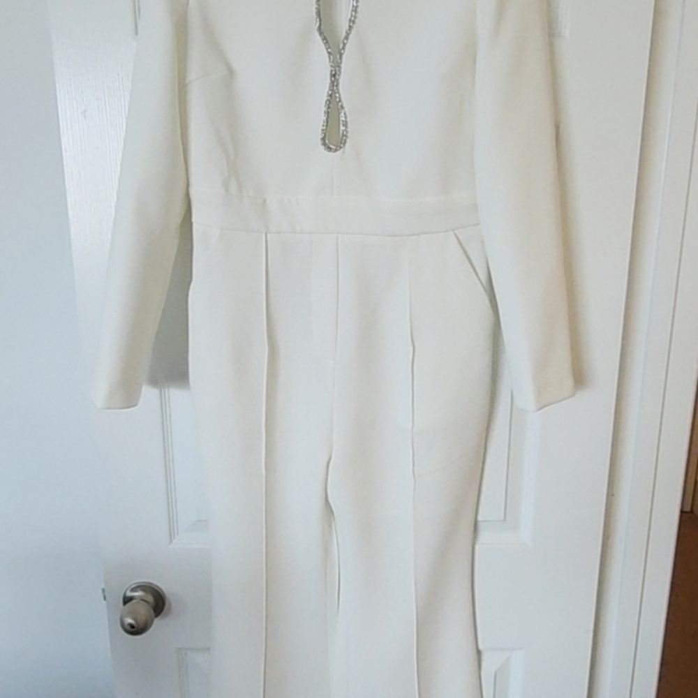 Elegant White Jumpsuit with Chain Detail